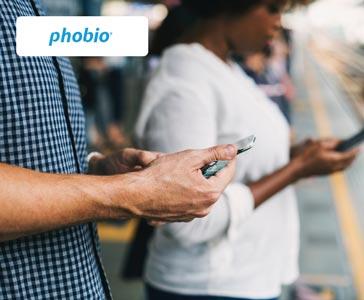 young commuters waiting for the train with new trade-in devices