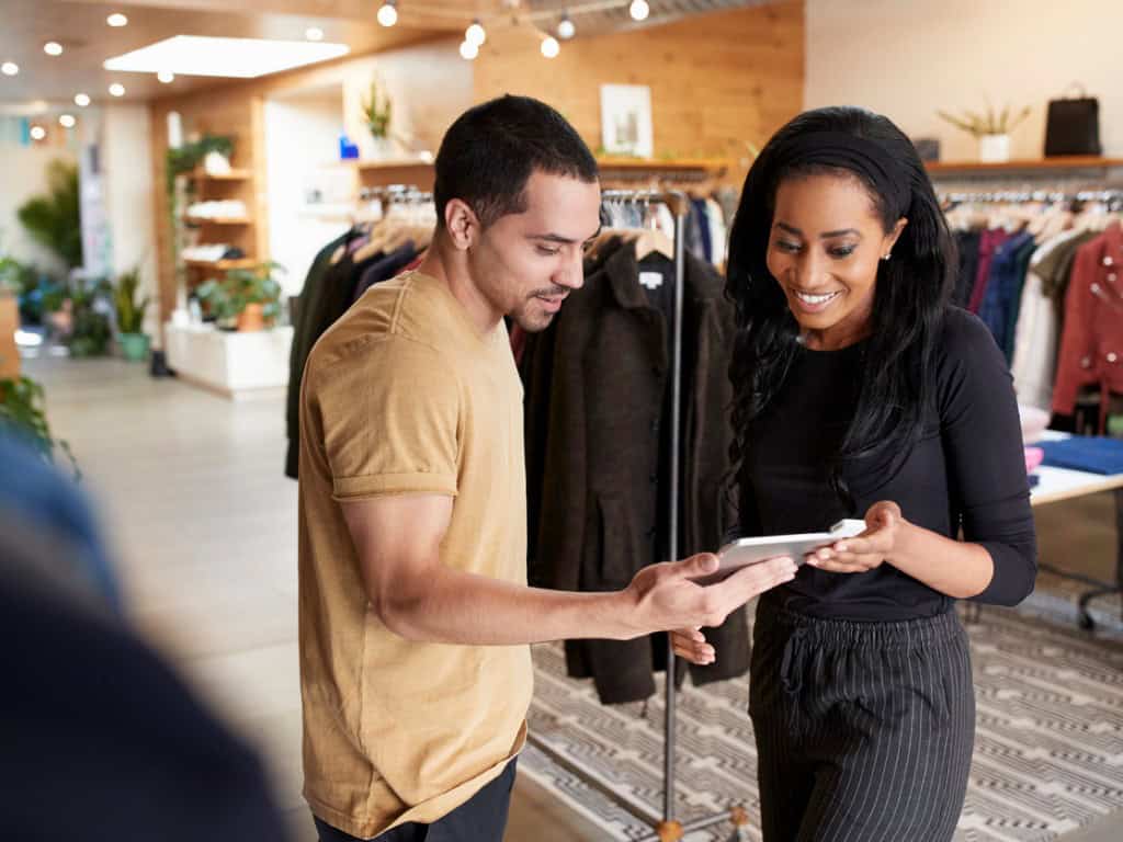 boutique using a trade-in tablet for in-store purchase